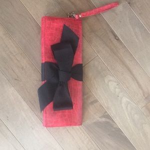 Faux snake skin clutch